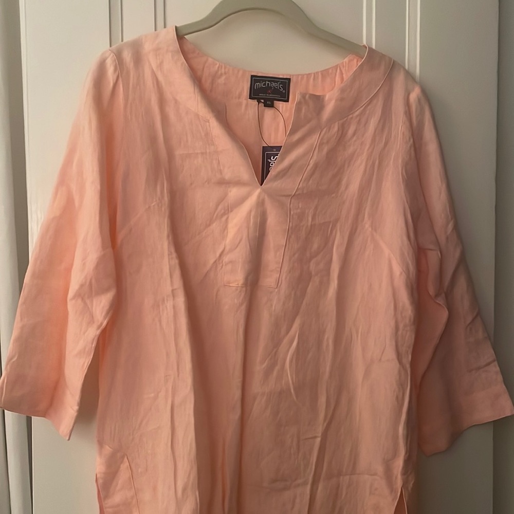 Michael’s new with rage swim coverup